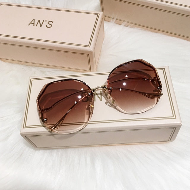 2022 Fashion Tea Gradient Sunglasses Women Ocean Water Cut Trimmed Lens Metal Curved Temples Sun Glasses Female UV400